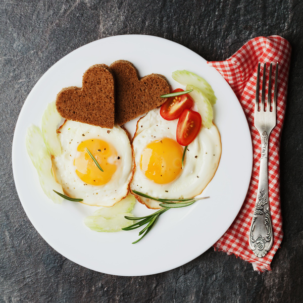 Heart-shaped fried egg and bread breakfast Stock Photo 07