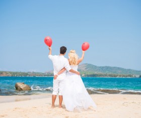 Holding balloons newlyweds Stock Photo