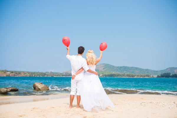 Holding balloons newlyweds Stock Photo
