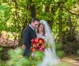 In the woods wedding photographs of the couple Stock Photo