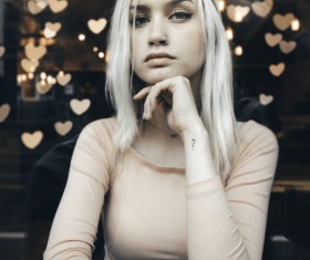 Indifferent young blonde girl Stock Photo