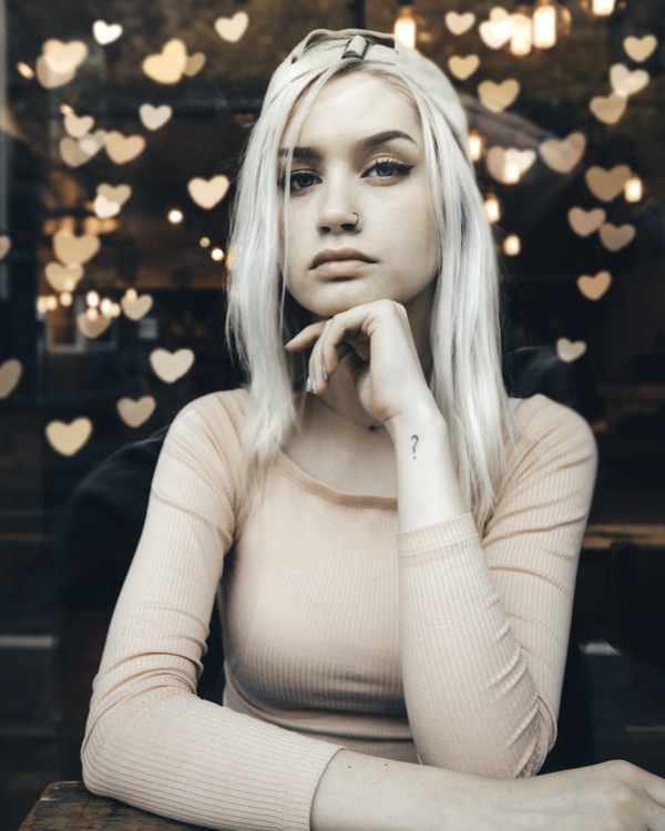 Indifferent young blonde girl Stock Photo