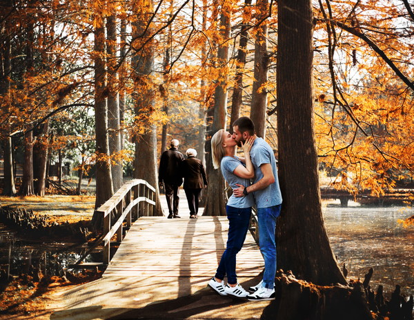 Intimate couple in the park Stock Photo