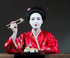 Japanese girl eating sushi Stock Photo 01