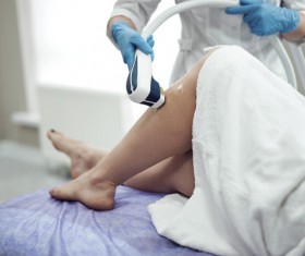 Laser hair removal for womens legs Stock Photo