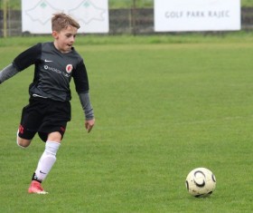 Little boy playing football Stock Photo