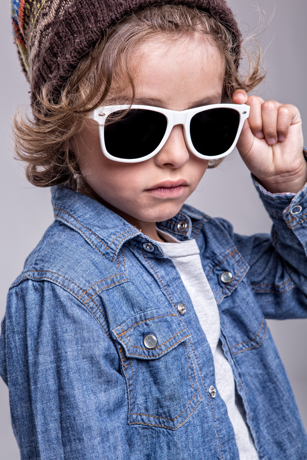 Little boy wearing sunglasses Stock Photo