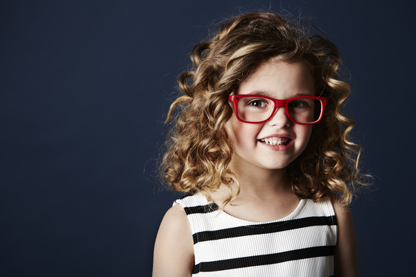 Portrait of little girl wearing glasses stock photo