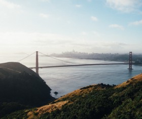 Long bridge structure on calm sea Stock Photo