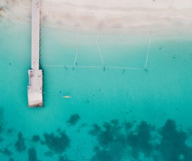 Long jetty on the clean blue sea Stock Photo