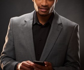 Man holding smart phone Stock Photo