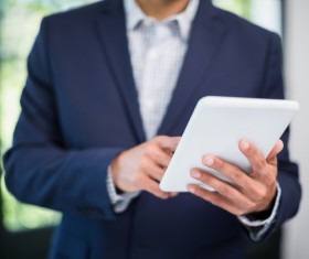 Man using tablet PC Stock Photo