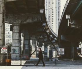 Man walking on the open road Stock Photo