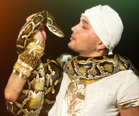 Man with pet snake Stock Photo 02