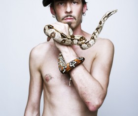 Man with pet snake Stock Photo 03