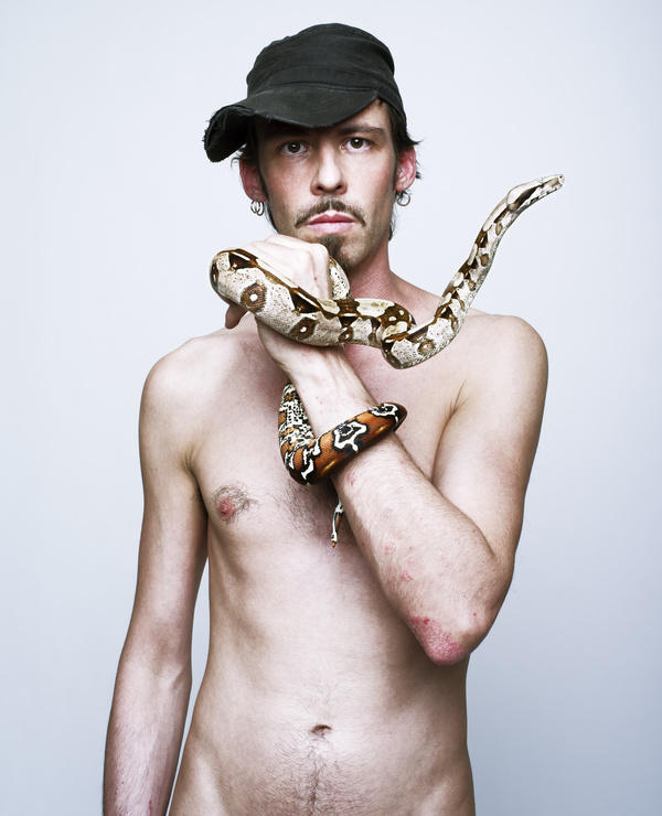 Man with pet snake Stock Photo 03