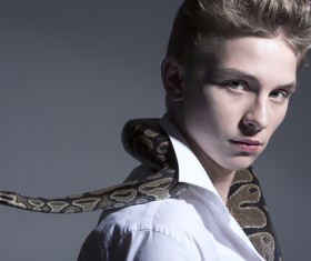 Man with pet snake Stock Photo 07