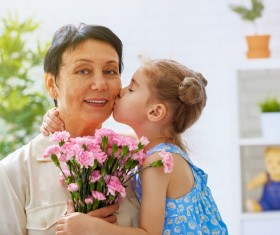 Mothers Day gave grandmas flowers Stock Photo 01