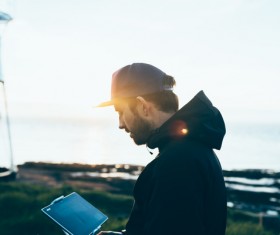 Outdoor using computer man Stock Photo