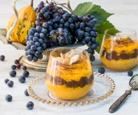 Pumpkin dessert and grapes Stock Photo