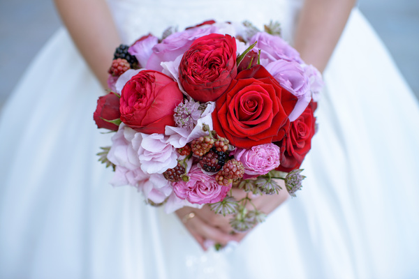Rose bouquet in the hands of the bride Stock Photo