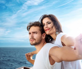 Seaside posing young couple Stock Photo 02