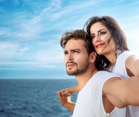 Seaside posing young couple Stock Photo 03