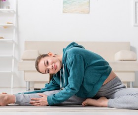 Slim girl practicing yoga indoors Stock Photo 02