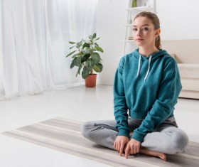Slim girl practicing yoga indoors Stock Photo 04