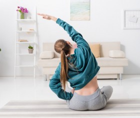 Slim girl practicing yoga indoors Stock Photo 05