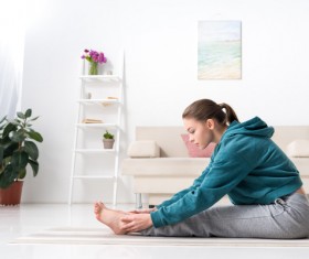 Slim girl practicing yoga indoors Stock Photo 06