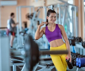 Smiling woman in the gym Stock Photo