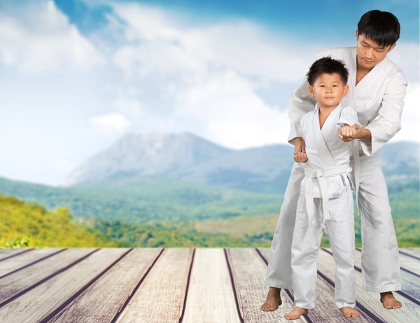 Teach children to practice karate Stock Photo