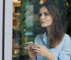 Using smartphone woman Stock Photo