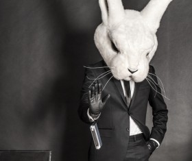 Wearing rabbit head Man Stock Photo