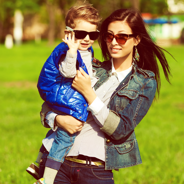 Wearing sunglasses young mother and child Stock Photo 03