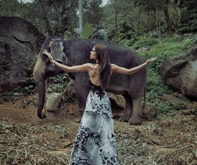 Woman and elephant live in harmony Stock Photo 02