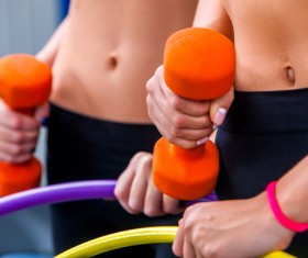 Woman doing arm exercise in gym Stock Photo 05