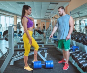 Woman doing arm exercise in the gym Stock Photo 03