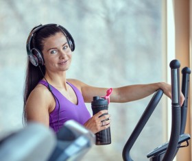 Woman exercising on a treadmill Stock Photo 05