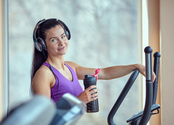 Woman exercising on a treadmill Stock Photo 05
