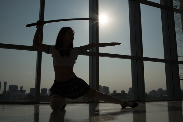 Woman practicing martial arts Stock Photo