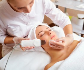Womens skin massage Stock Photo