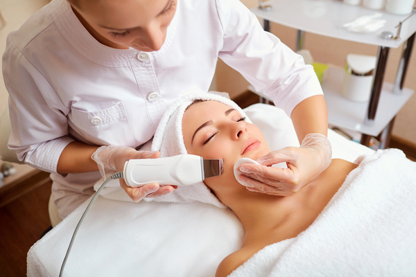 Womens skin massage Stock Photo