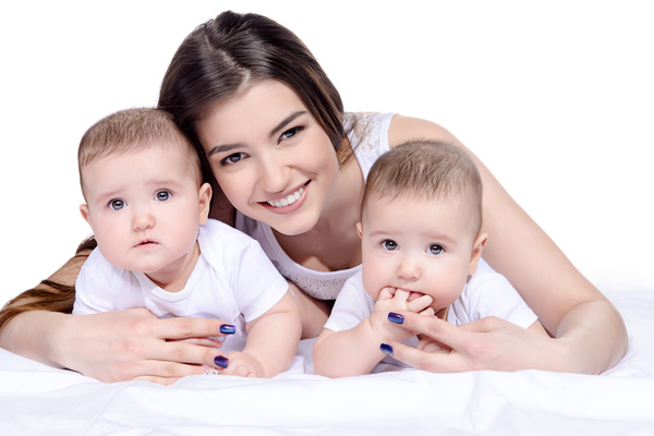 Young beautiful mother and two children Stock Photo 02