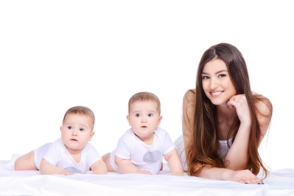 Young beautiful mother and two children Stock Photo 04