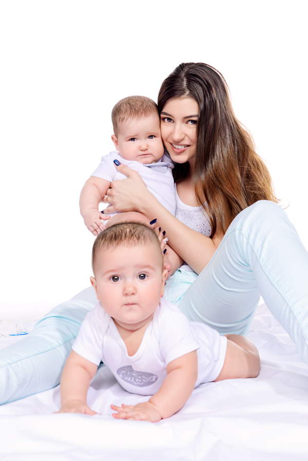 Young beautiful mother and two children Stock Photo 05