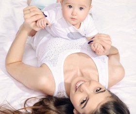 Young mother hugging her child Stock Photo 01