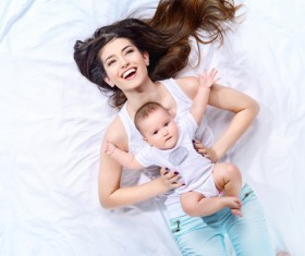 Young mother hugging her child Stock Photo 02