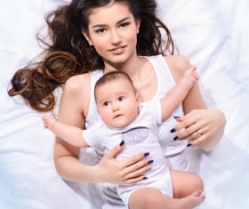 Young mother hugging her child Stock Photo 04